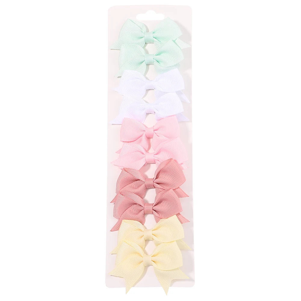 Lot de 10 pinces à cheveux nœuds unis pour filles – pinces faites à la main en ruban, accessoires de coiffure parfaits pour bébé et fêtes de Nouvel An.