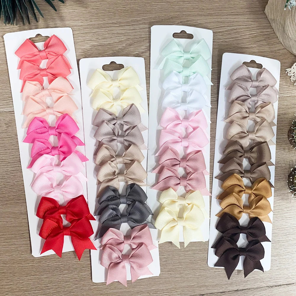 Lot de 10 pinces à cheveux nœuds unis pour filles – pinces faites à la main en ruban, accessoires de coiffure parfaits pour bébé et fêtes de Nouvel An.