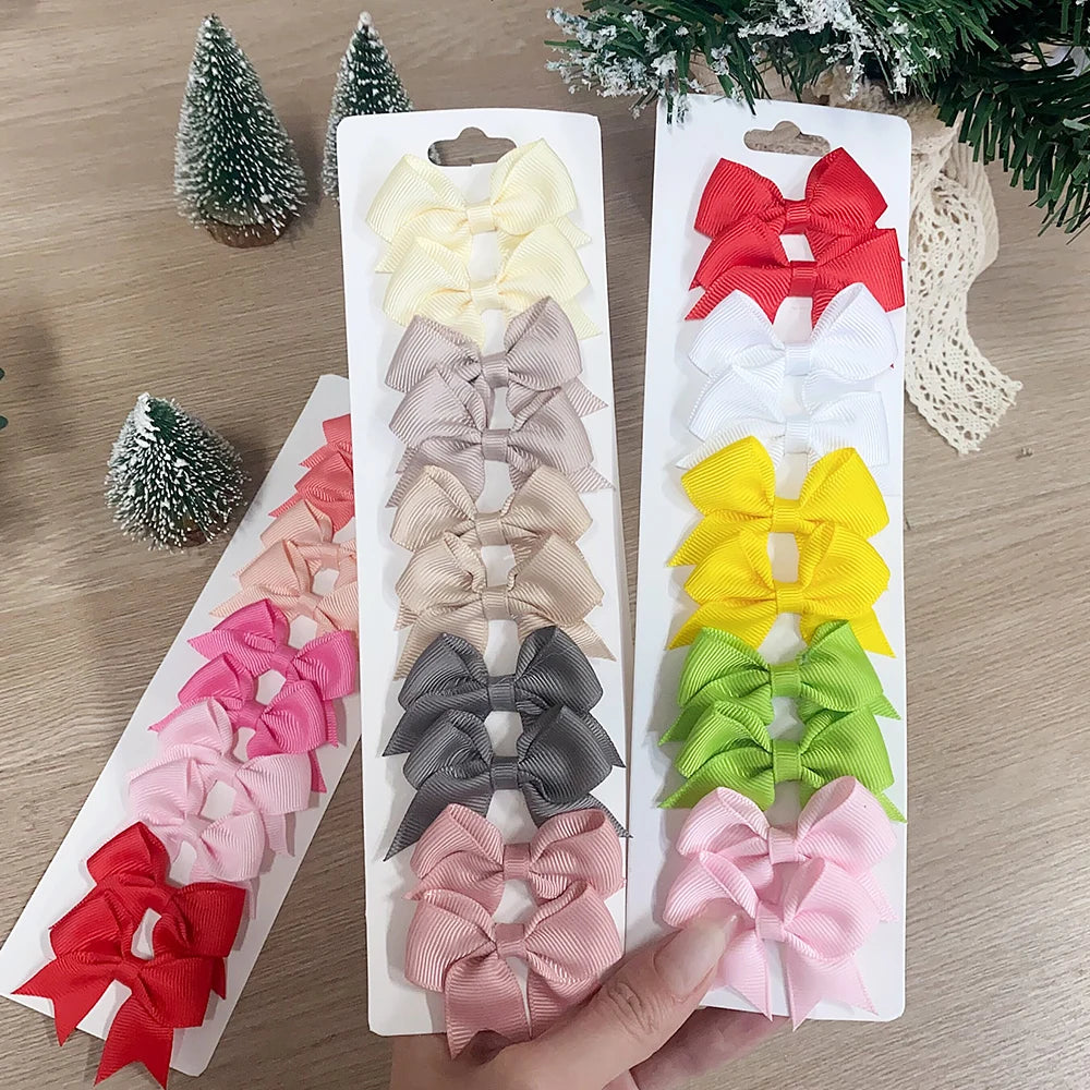 Lot de 10 pinces à cheveux nœuds unis pour filles – pinces faites à la main en ruban, accessoires de coiffure parfaits pour bébé et fêtes de Nouvel An.