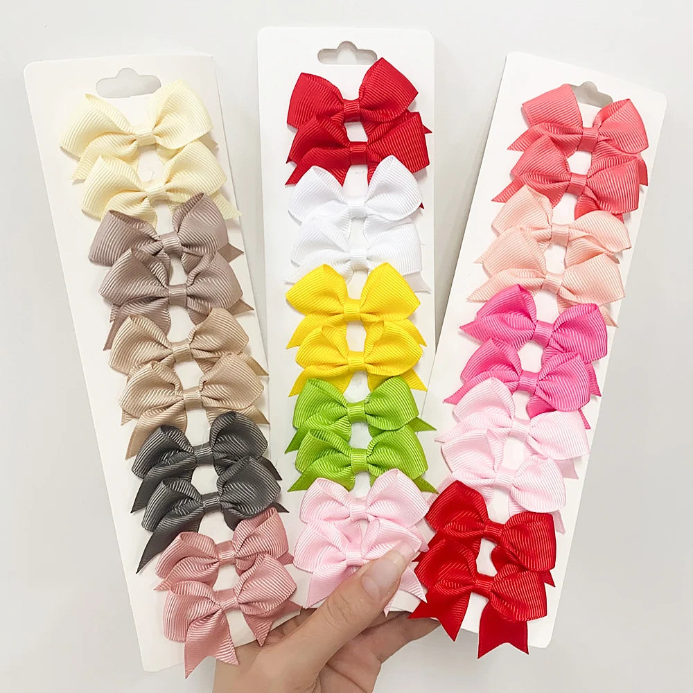 Lot de 10 pinces à cheveux nœuds unis pour filles – pinces faites à la main en ruban, accessoires de coiffure parfaits pour bébé et fêtes de Nouvel An.